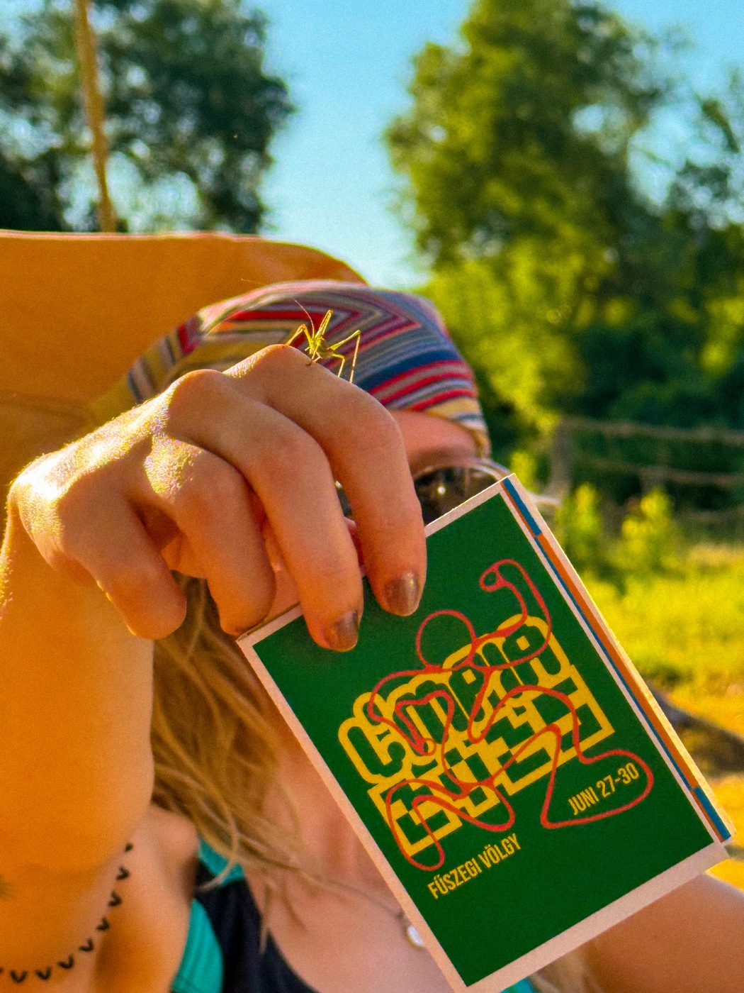 A guest holding the green Limpia flyer